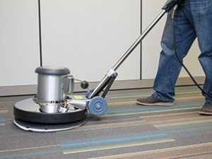 Carpets getting cleaned with rotary brush