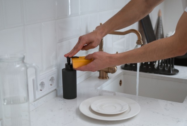 using soap for cleaning dishes